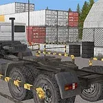 Vit lastbil utan släp i en containerterminal med staplade fraktcontainrar i bakgrunden