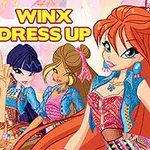 Fyra tecknade karaktärer i färgglada kläder står framför en ljus bakgrund med texten WINX DRESS UP ovanför
