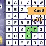 Ordspel med bokstäver i rutnät, markeringen av ett ord och poängökning med meddelandet Cool!