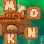 Trälådor med bokstäver och en apa som svingar sig i bakgrunden med texten word wood i mitten