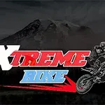 Logotyp för XTREME BIKE med en motorcyklist som utför ett hopp mot en bergsbakgrund