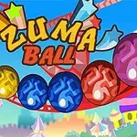 Färgglada sfäriska bollar med texten Zuma Ball mot en bakgrund av en nöjespark med ett pariserhjul
